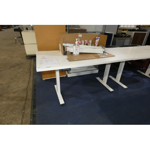 1319 - A white electric rise and fall table by Flexispot - missing power adaptor approx 150*75 trade