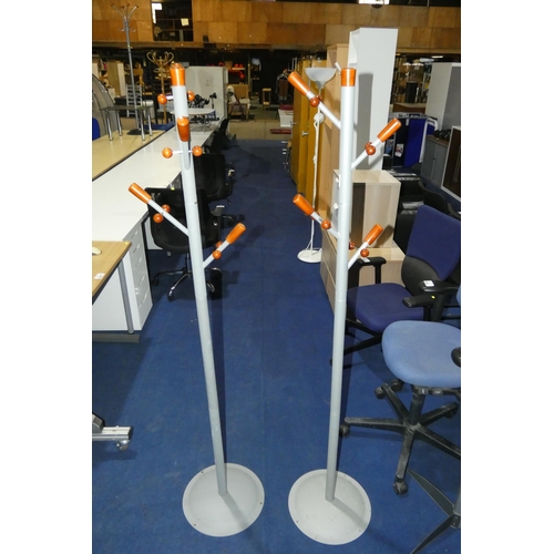 1332 - 2 x silver and wood effect hat and coat stands