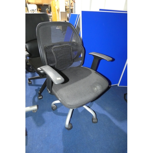 1340 - A black upholstered office swivel chair