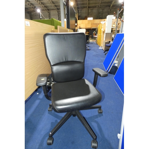 1341 - A black leather effect office swivel chair by Steelcase