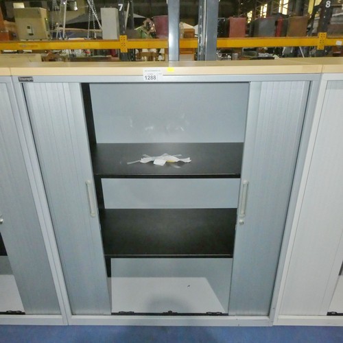 1288 - A grey metal 2 tambour door office cabinet by Triumph approx 100x48x121cm