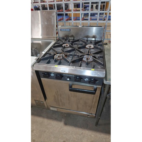 1136 - A commercial stainless steel 4 ring gas fired range with single door oven beneath approx 60x85cm