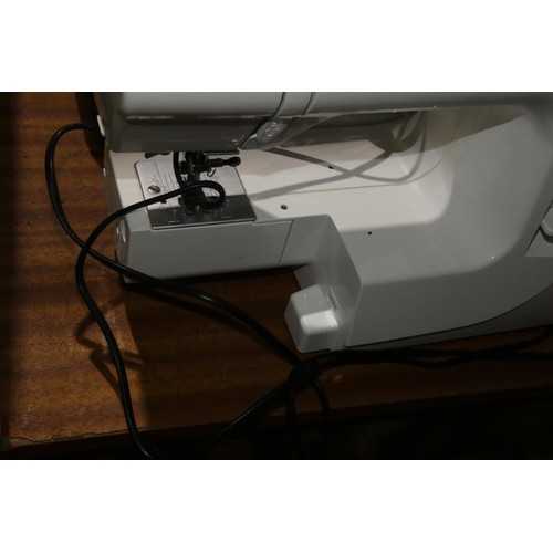 2032 - 1 x Janome J3-24 sewing machine 240v (part of plastic casing missing) and a small rodent / rabbit pe... 