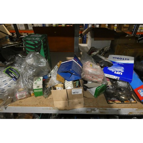 5612 - A quantity of various auto related spares including brake parts, lights, mirrors, a spring etc. Not ... 