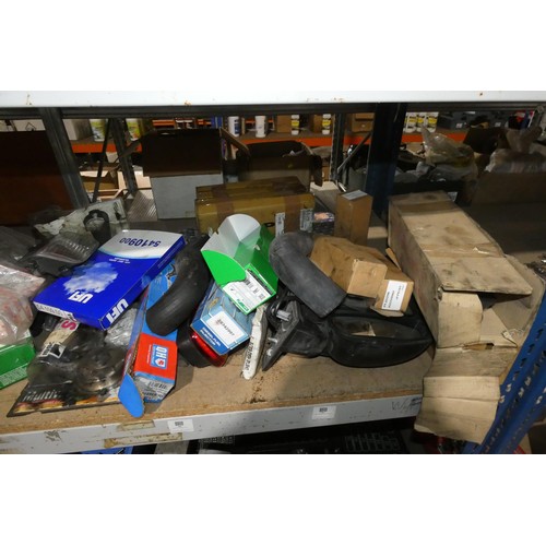 5612 - A quantity of various auto related spares including brake parts, lights, mirrors, a spring etc. Not ... 