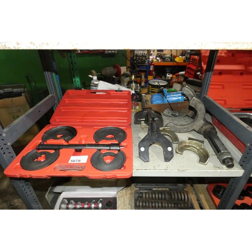 5678 - A quantity of various specialist tools including a Mercedes spring compressor, a twin cone wheel bea... 