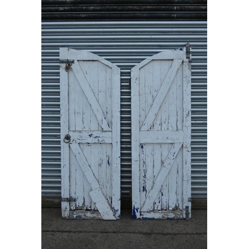 6310 - A pair of used garden gates, each measuring approx 69cm x 198cm - both have been fitted previously a... 