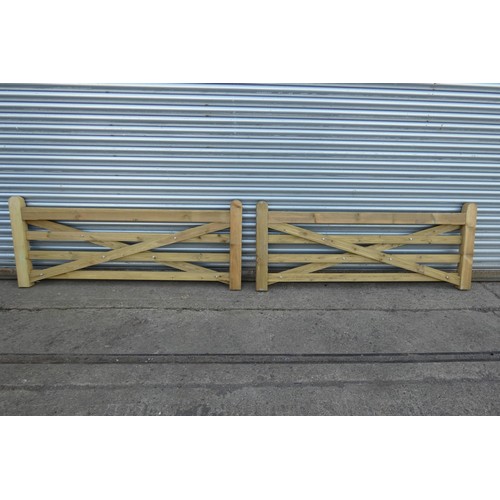 6311 - A pair of wooden gates each measuring approx 185cm x 75cm