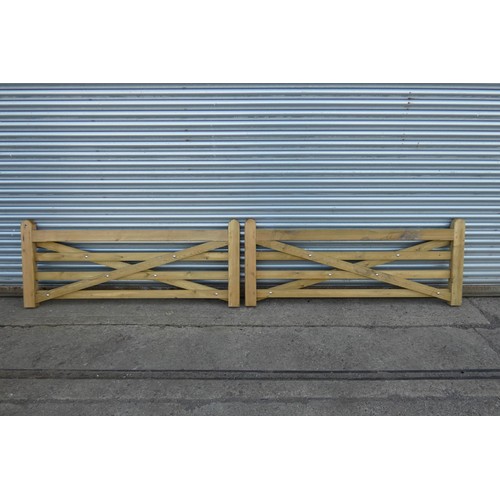 6311 - A pair of wooden gates each measuring approx 185cm x 75cm