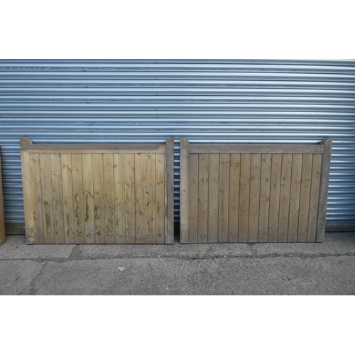 6312 - A pair of wooden gates each measuring approx 164 x 118cm