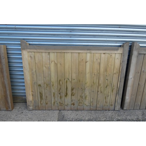 6312 - A pair of wooden gates each measuring approx 164 x 118cm