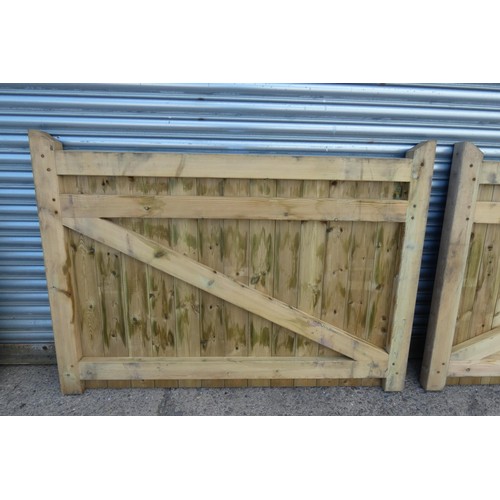 6312 - A pair of wooden gates each measuring approx 164 x 118cm