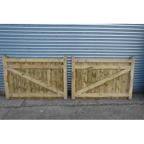 6312 - A pair of wooden gates each measuring approx 164 x 118cm