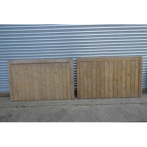 6313 - A pair of wooden gates each measuring approx 171 x 110cm