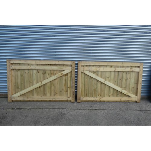 6313 - A pair of wooden gates each measuring approx 171 x 110cm