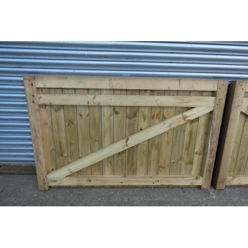 6313 - A pair of wooden gates each measuring approx 171 x 110cm