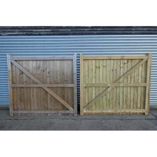 6316 - Two similar sized wooden driveway gates each measuring approx 199 x 180cm, not matching.