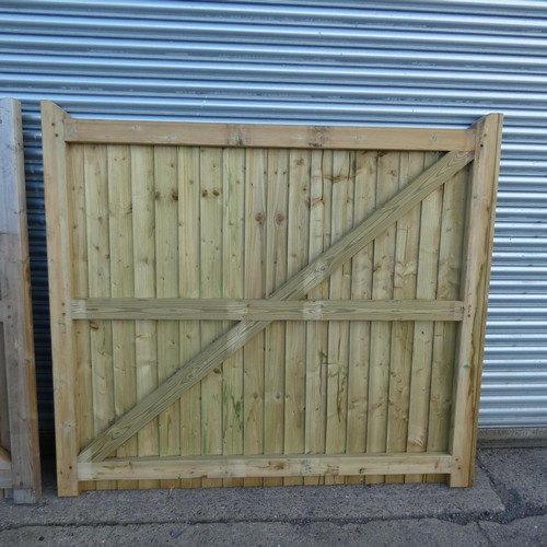 6316 - Two similar sized wooden driveway gates each measuring approx 199 x 180cm, not matching.