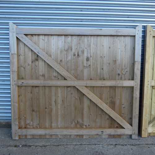 6316 - Two similar sized wooden driveway gates each measuring approx 199 x 180cm, not matching.