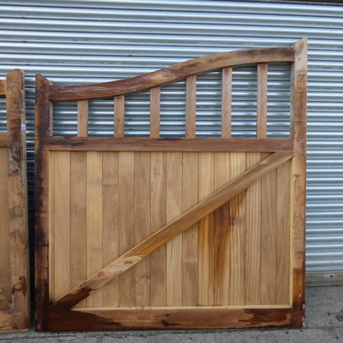 6323 - A pair of hardwood (Iroko) driveway gates each measuring approx 190 x 210cm