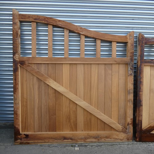 6323 - A pair of hardwood (Iroko) driveway gates each measuring approx 190 x 210cm