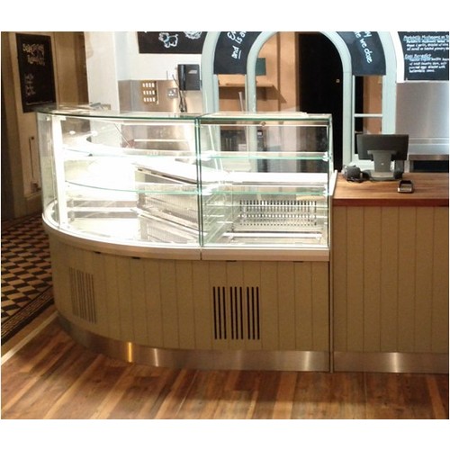 1018 - An unused commercial stainless steel curved/corner refrigerated serve over counter by Ciam of Italy,... 