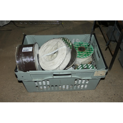 2045 - A quantity of various rolls of electric cable. Please note that the plastic crate is not included