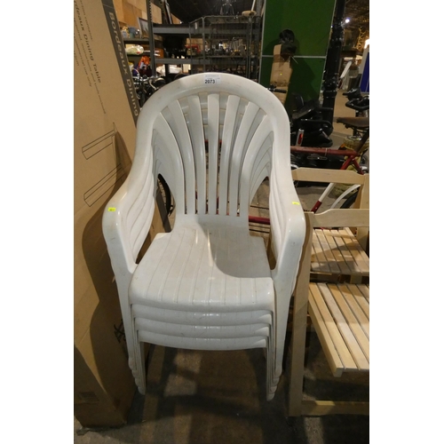 2073 - 4 x white plastic garden stacking chairs