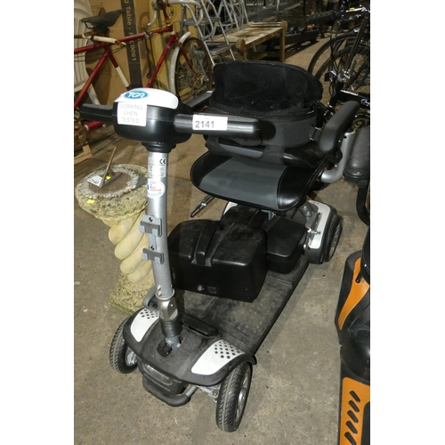 2141 - 1 x TGA battery powered mobility scooter model 1103130 supplied with a key, a spare battery and a ma... 