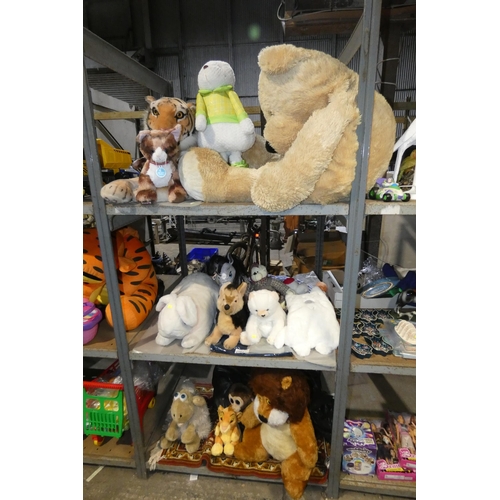 2162 - A quantity of various soft toys and 1 x small rug. Contents of 1 bay /3 shelves