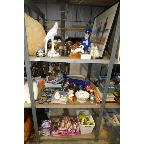 2163 - A quantity of various items including ornaments, a parrot table lamp 240v, dolls, toy tractors. Cont... 