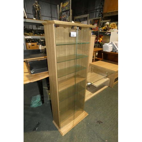 2184 - 1 x wood effect glass door display cabinet approx 53 x 23 x 131cm high