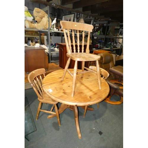 2192 - 1 x Pine round dining table diameter approx 105cm and 3 x wooden dining chairs - Please note that th... 