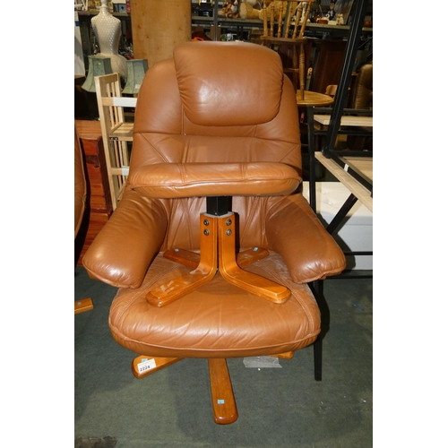 2224 - 1 x brown upholstered reclining swivelling lounge chair with a matching foot stool - Please note tha... 