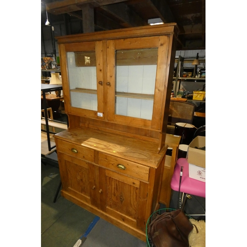 2226 - A Pine two part dresser with 2 glass doors above, 2 drawers / 2 doors below, overall approx 129cm x ... 