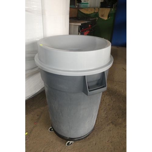 1020 - A mobile bin by Rubbermaid with funnel lid and dolly