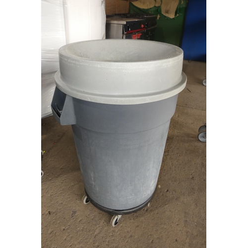1025 - A mobile bin by Rubbermaid with funnel lid and dolly