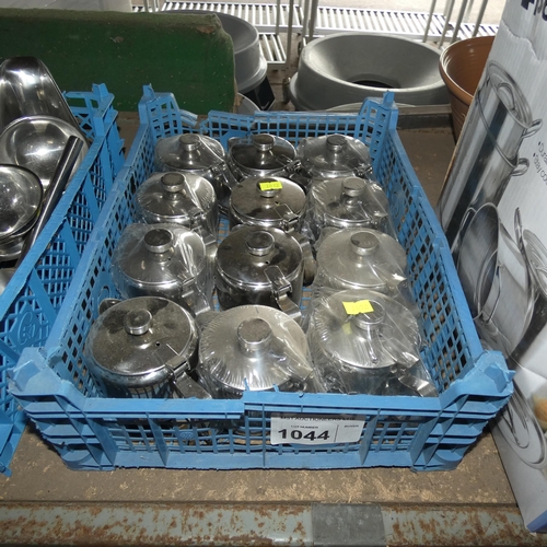 1044 - 12 x small stainless teapots