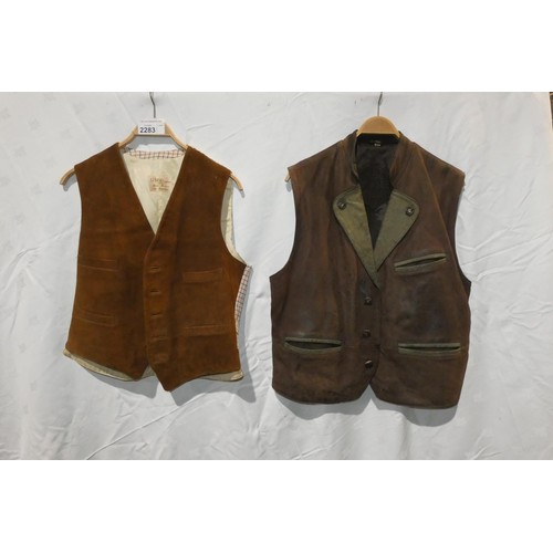 2283 - 2 x waistcoats comprising 1 x WM Leather Wear size 54 and 1 x G H Clayton size not visible