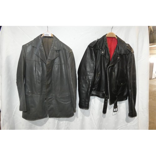 2284 - 2 x leather jackets comprising 1 x grey size 48 and 1 x black with no details visible