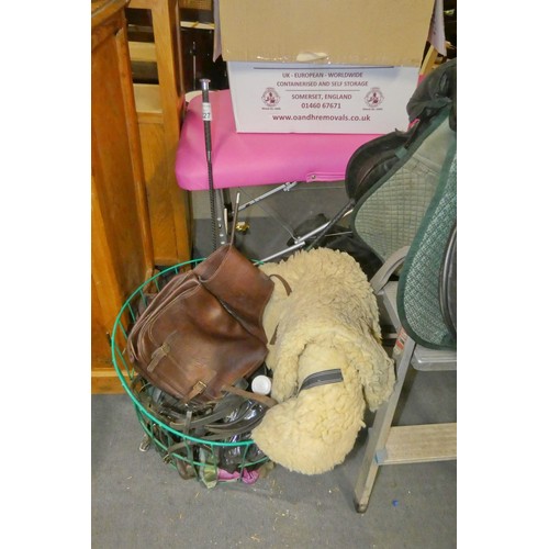 2227 - A quantity of various equestrian related items including a saddle bag, whips, tack etc. Not practica... 