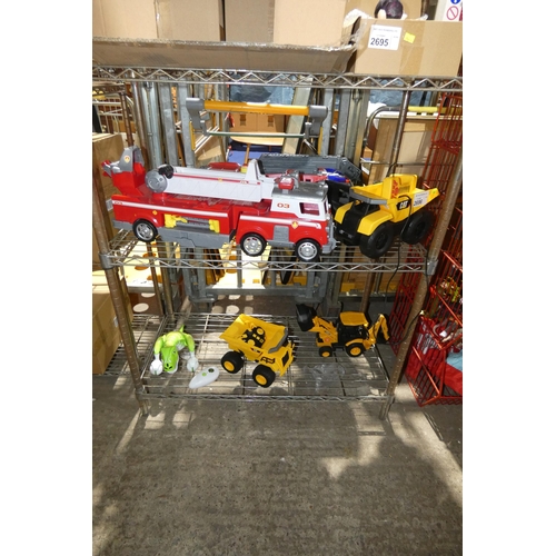 2696 - A quantity of various toys kids including fire trucks, cat vehicles etc, contents of 2 shelves