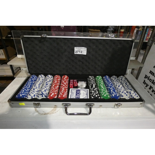 2712 - A complete poker set inc chips, cards, dice & hard case