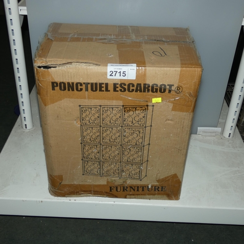 2715 - A 12 section shelving rack by Ponctuel Escargot, boxed