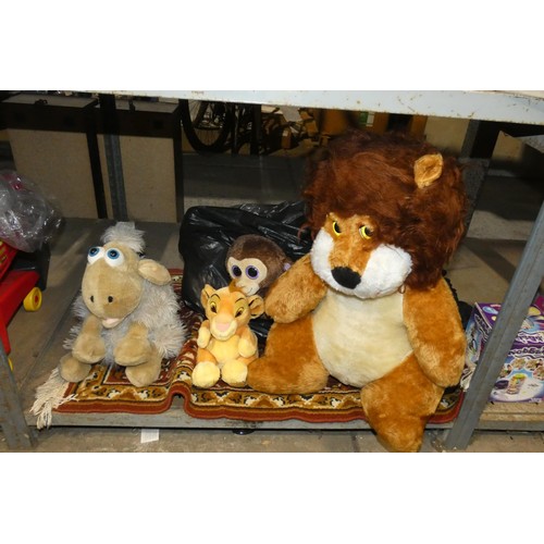 2162 - A quantity of various soft toys and 1 x small rug. Contents of 1 bay /3 shelves