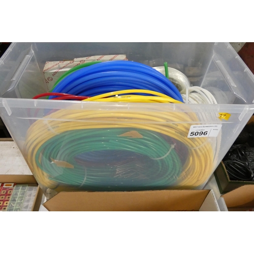 5096 - 1 box containing a quantity of various  pneumatic tube- The plastic box is included