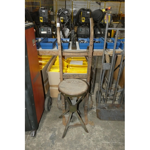 5148 - A set of vintage wooden sack trucks and a vintage metal framed engineers stool with wooden seat pad