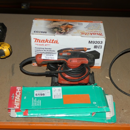 5198 - 1 x Makita M9203 finishing sander 240v and a quantity of Hitachi abrasive sheets