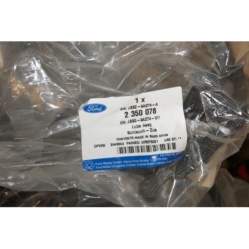 5038 - 1 pallet containing a quantity of various unused Ford spares including timing belts, a clutch kit, a... 