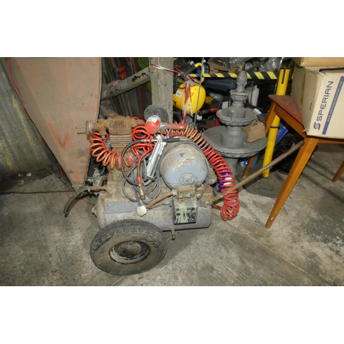 5775 - 1 x wheeled air compressor 240v (no other details visible) supplied with a air line, a tyre inflator... 